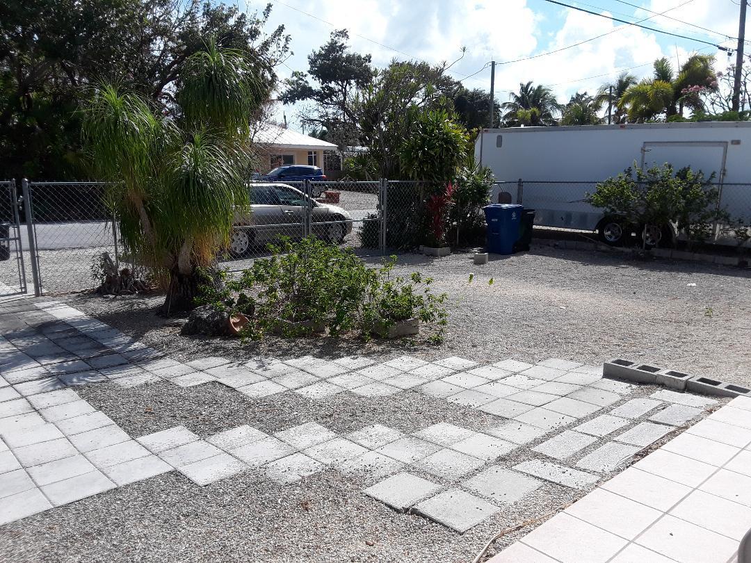14 Jewfish Avenue Key Largo, FL 33037 - Photo 5 of 44 a view of a backyard