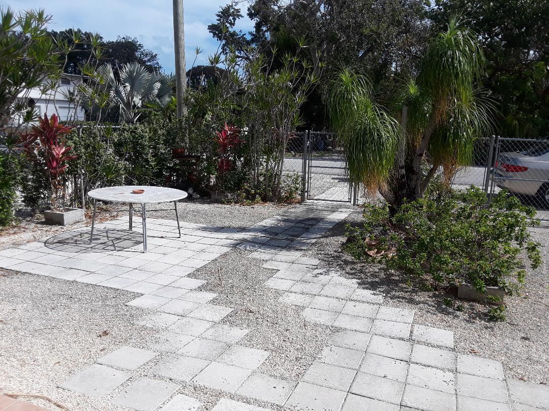 14 Jewfish Avenue Key Largo, FL 33037 - Photo 6 of 44 a view of a backyard with sitting area