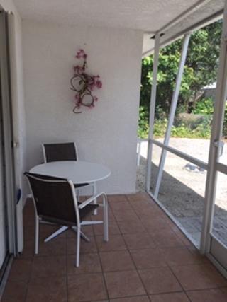 14 Jewfish Avenue Key Largo, FL 33037 - Photo 8 of 44 a view of a workspace with a window