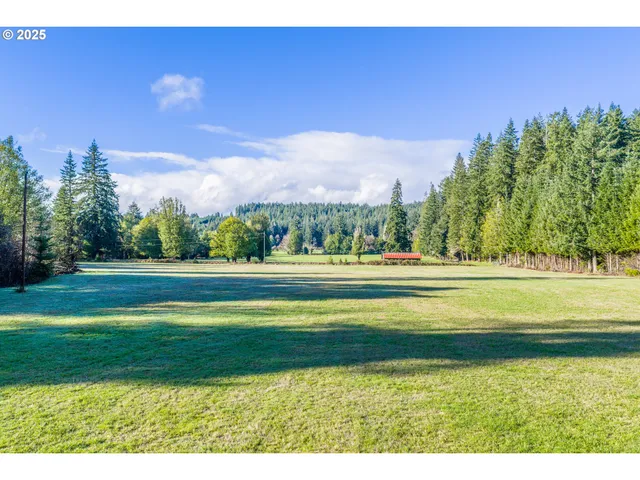 a view of building with trees in the background