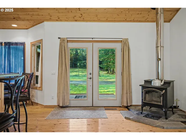 a patio with table and chairs