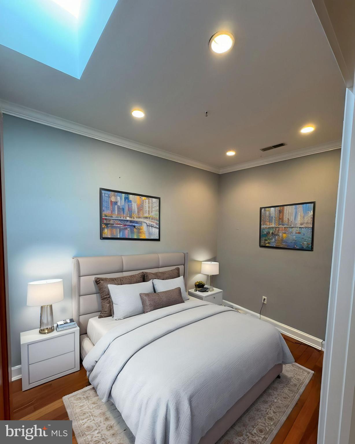 3445 14th Street Northwest, Unit 3 Washington, DC 20010 - Photo 7 of 15 a bedroom with a bed and a lamp