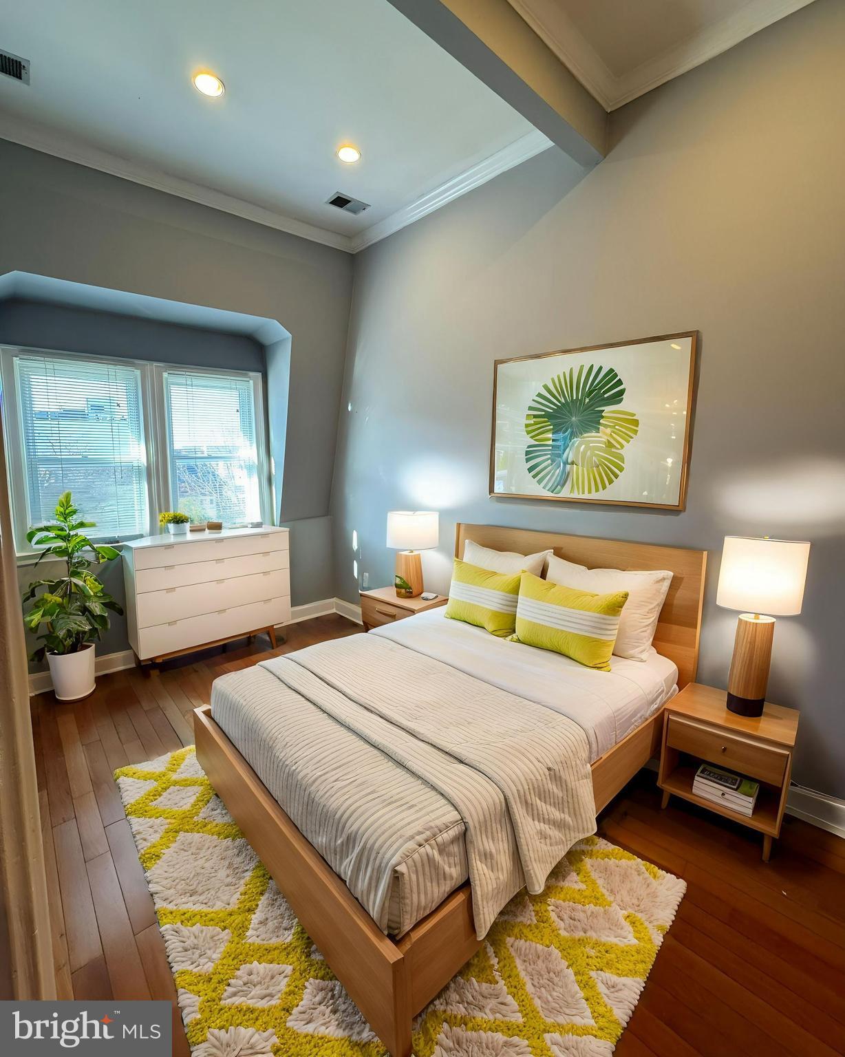 3445 14th Street Northwest, Unit 3 Washington, DC 20010 - Photo 8 of 15 a bedroom with a bed and window