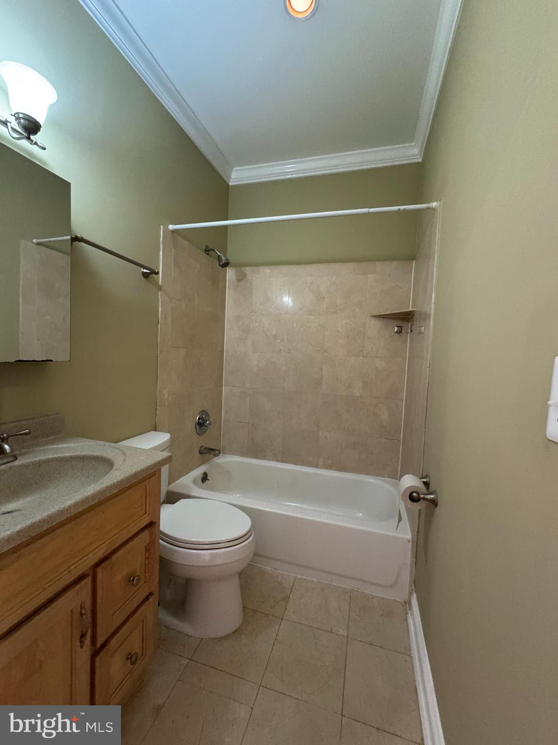 3445 14th Street Northwest, Unit 3 Washington, DC 20010 - Photo 10 of 15 a bathroom with a granite countertop sink a toilet and shower