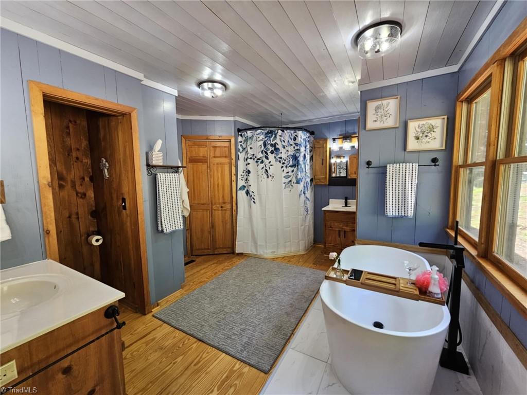 290 Jonathan Drive Lowgap, NC 27024 - Photo 27 of 50 Primary Suite double vanities and water closets. Newly updated.