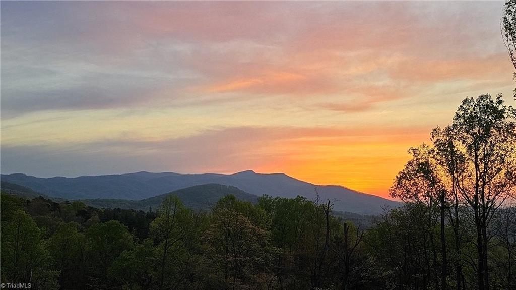 290 Jonathan Drive Lowgap, NC 27024 - Photo 7 of 50 Beautiful sunrises from the front deck
