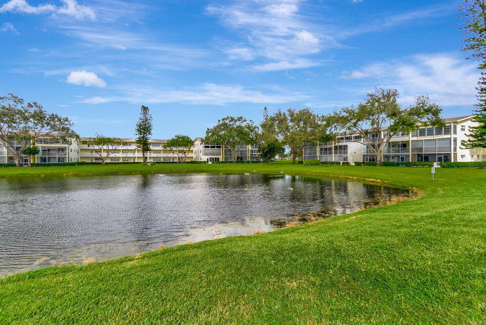 150 Dorset D, Unit 150 Boca Raton, FL 33434 - Photo 37 of 72 a view of a lake with a city