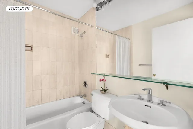 a picture of a bench in front of a building