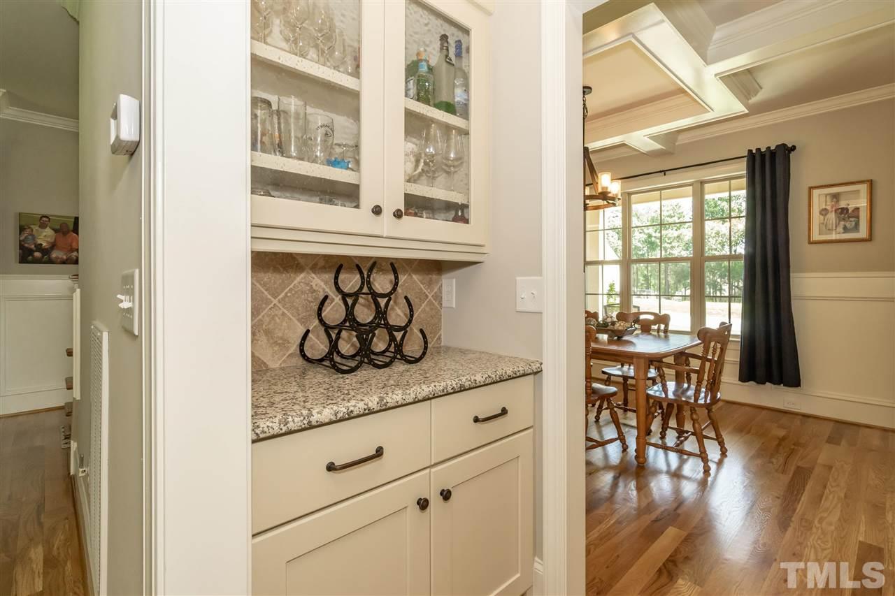 6112 Spring Branch Circle Raleigh, NC 27603 - Photo 18 of 30 a view of dining table chairs and window