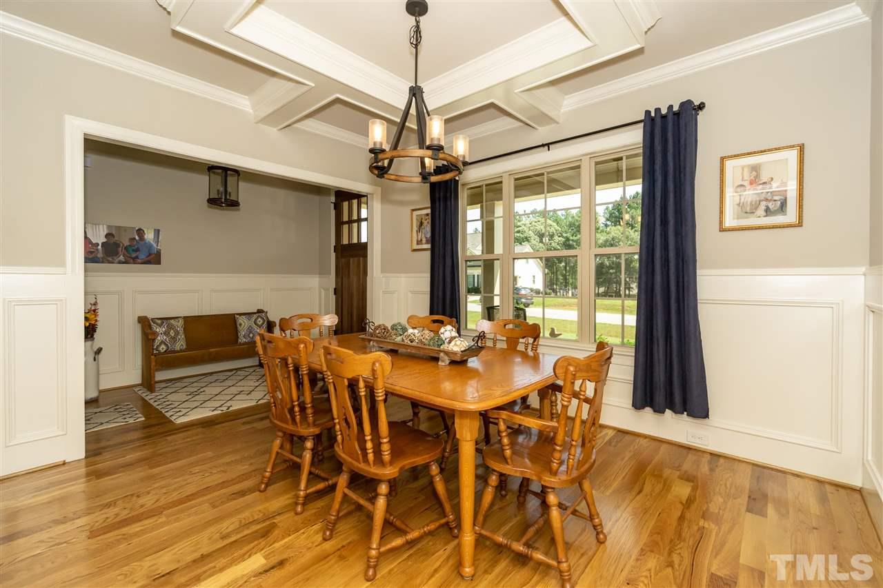 6112 Spring Branch Circle Raleigh, NC 27603 - Photo 19 of 30 a view of a dining room with furniture window and outside view