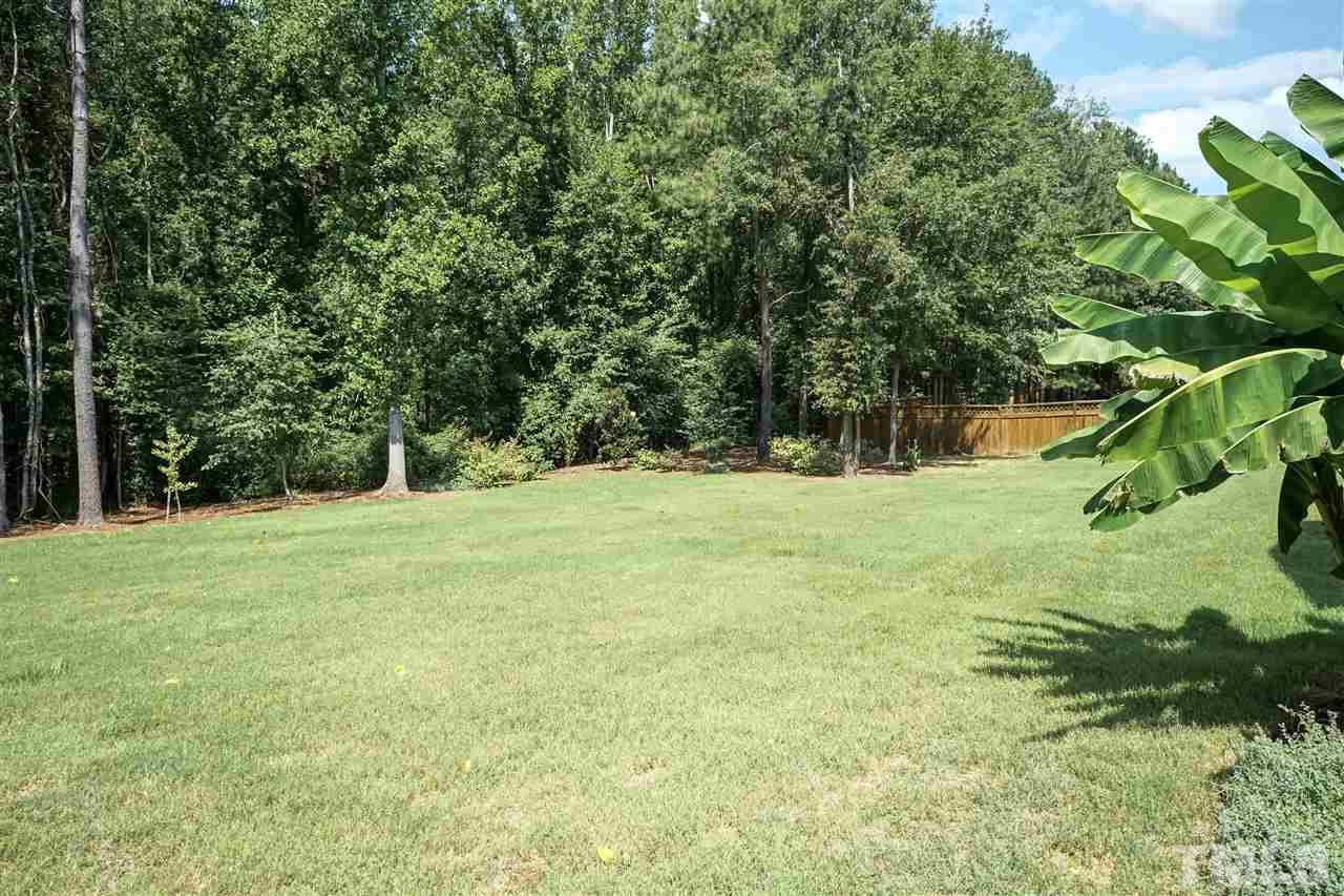 6112 Spring Branch Circle Raleigh, NC 27603 - Photo 4 of 30 a view of outdoor space with deck and yard