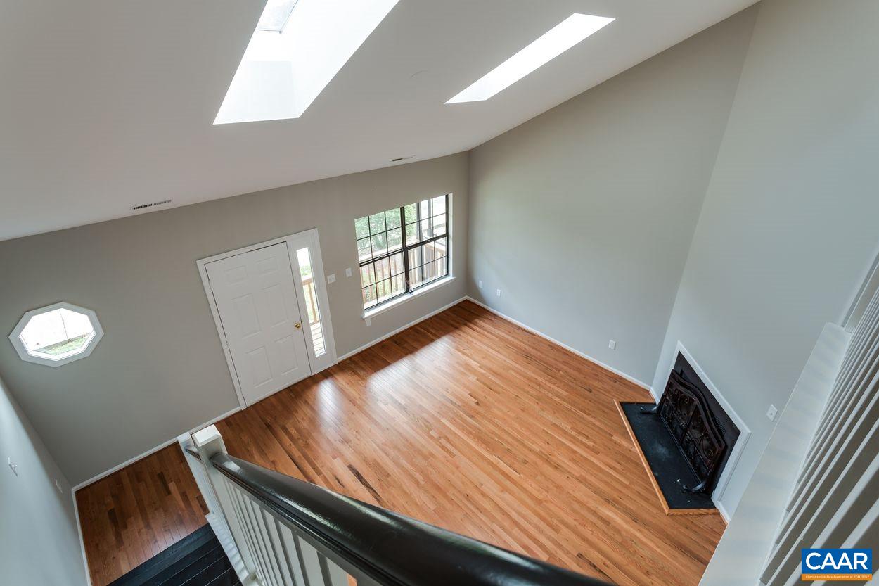 1006 Ridgeley Court Charlottesville, VA 22901 - Photo 14 of 25 a view of an empty room with windows