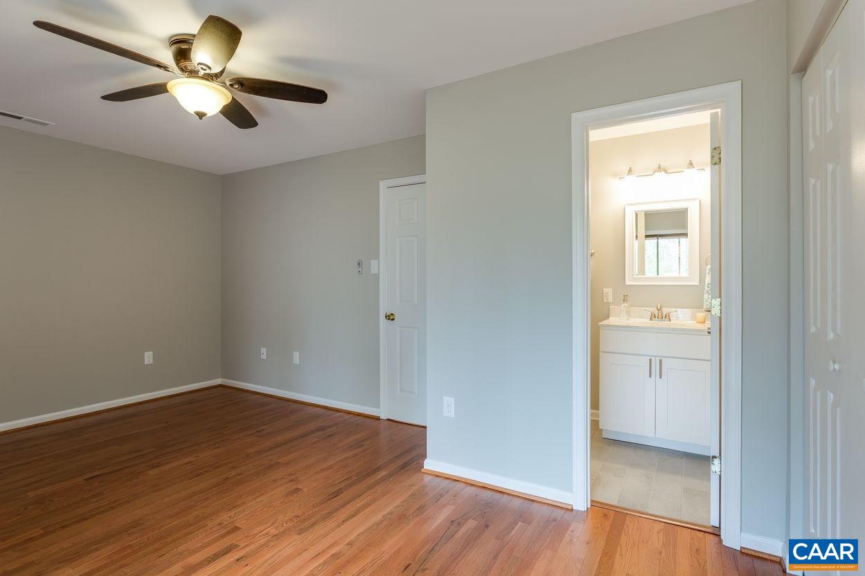 1006 Ridgeley Court Charlottesville, VA 22901 - Photo 10 of 25 wooden floor in an empty room with a window