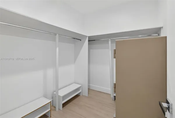 a view of room with walk in closet