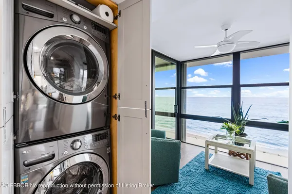 a view of livingroom with washer and dryer