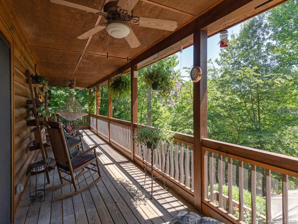 475 Indian Ridge Trail Hendersonville, NC 28739 - Photo 7 of 34 a view of balcony with wooden floor