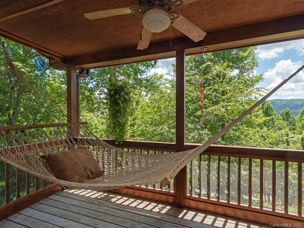 475 Indian Ridge Trail Hendersonville, NC 28739 - Photo 8 of 34 a view of a two chairs in the balcony