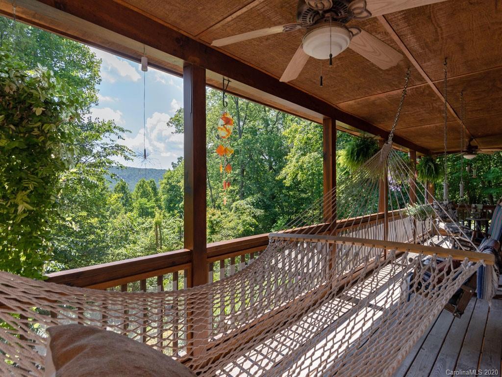 475 Indian Ridge Trail Hendersonville, NC 28739 - Photo 9 of 34 a view of a balcony with wooden floor