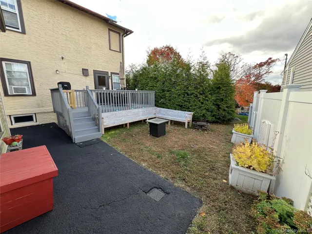 a view of a patio with chair and table