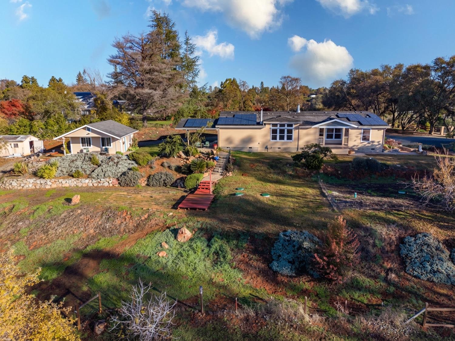 10665 Harris Road Auburn, CA 95603 - Photo 4 of 34 a view of a town with many houses