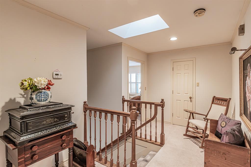 4708 Shady Ridge Court Fort Worth, TX 76109 - Photo 28 of 32 Level 2 landing. Walk in attic access.