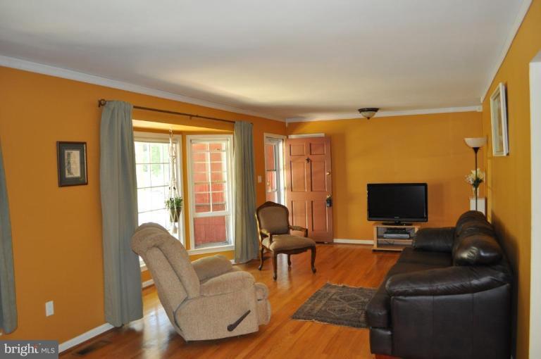 13005 Sturbridge Road Woodbridge, VA 22192 - Photo 2 of 7 LR w/bay window and gleaming hardwood floors.