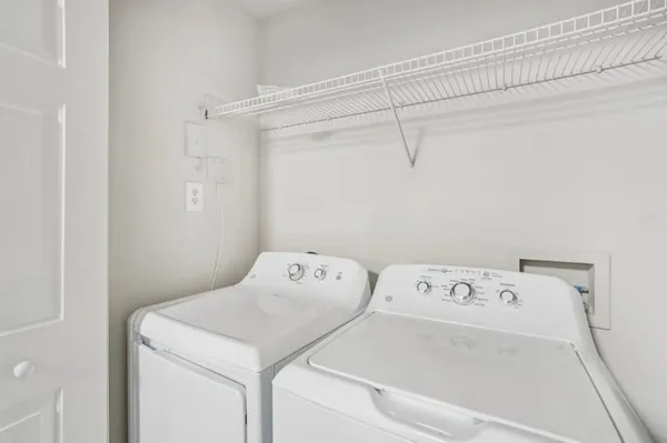 a picture of a living room and a fireplace