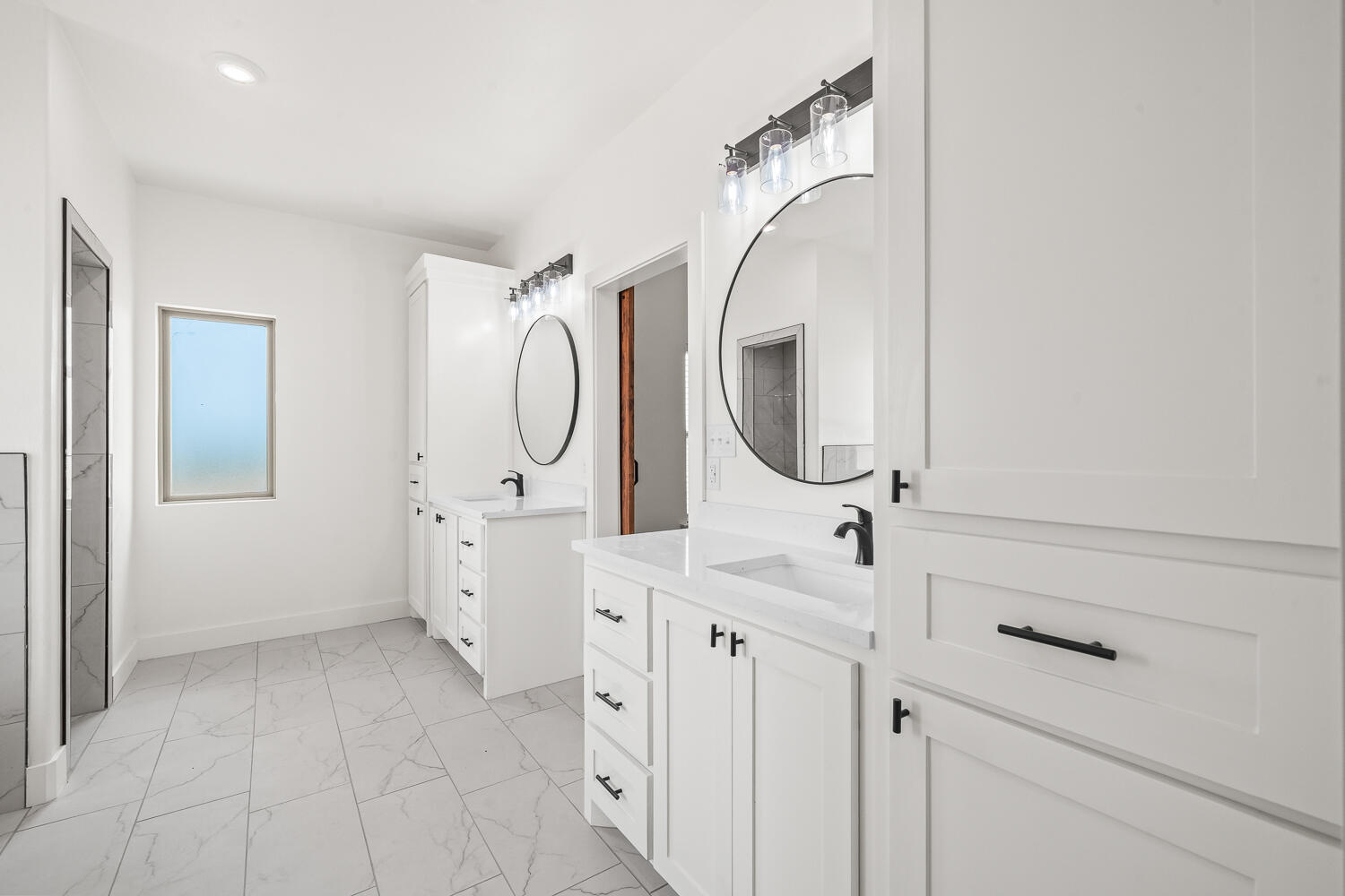 7205 East F M 41 Slaton, TX 79364 - Photo 12 of 47 a bathroom with a double vanity sink mirror and a shower