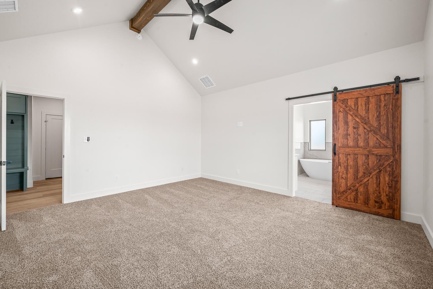 7205 East F M 41 Slaton, TX 79364 - Photo 7 of 47 an empty room with closet and windows