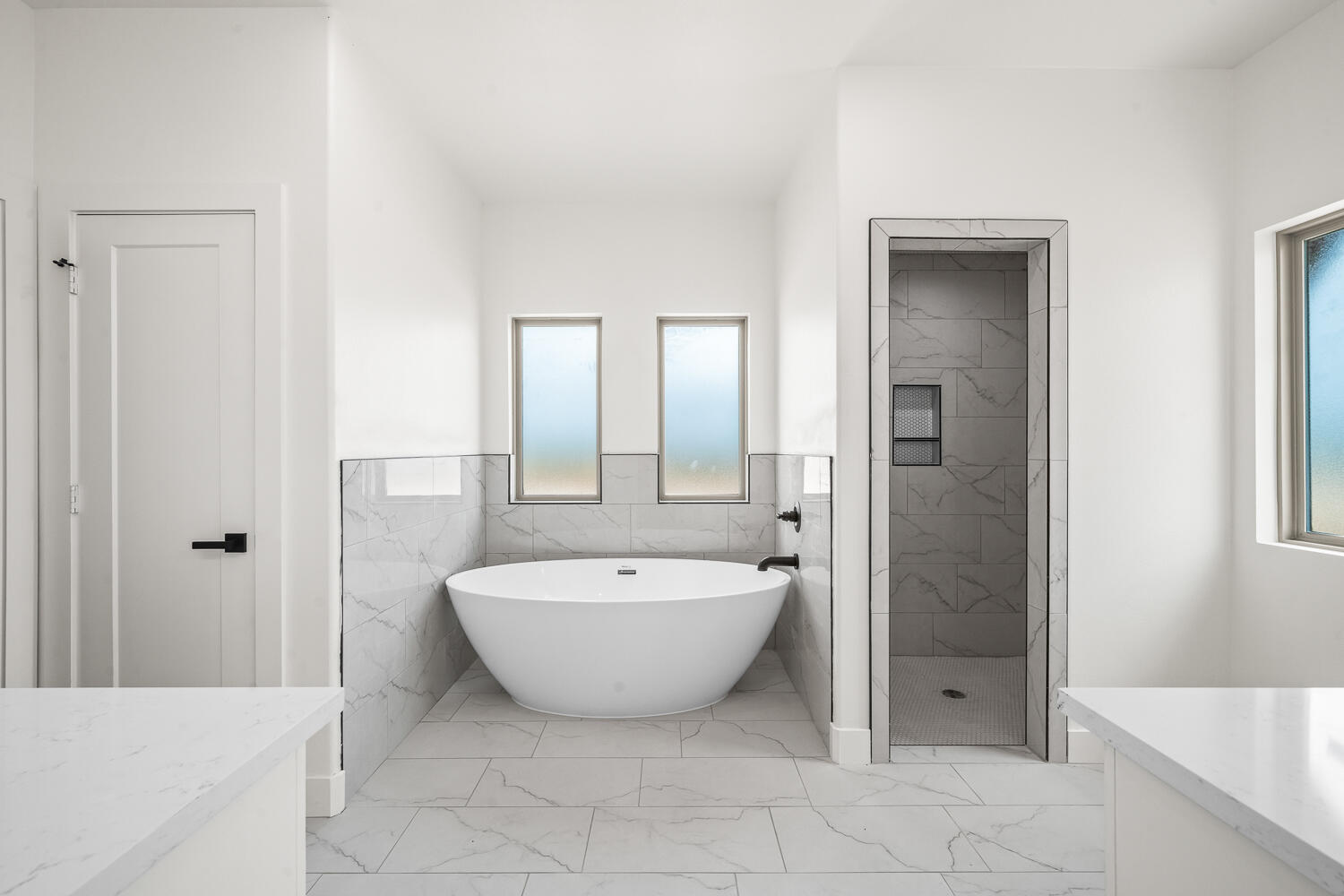 7205 East F M 41 Slaton, TX 79364 - Photo 8 of 47 a spacious bathroom with a bathtub sink and mirror