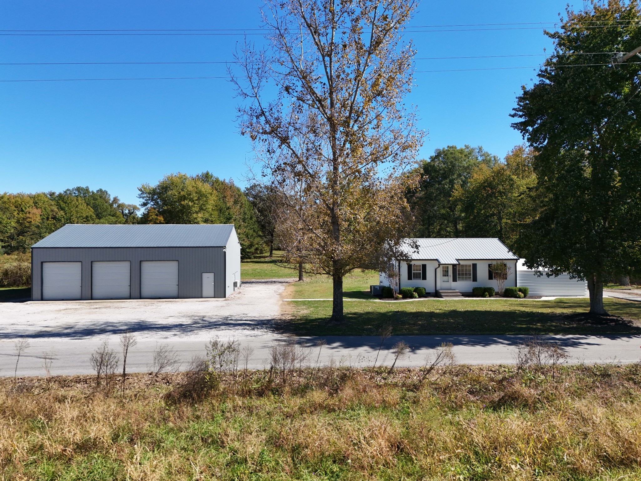 4437 Hickerson Road Manchester, TN 37355 - Photo 24 of 27 a front view of a house with a yard