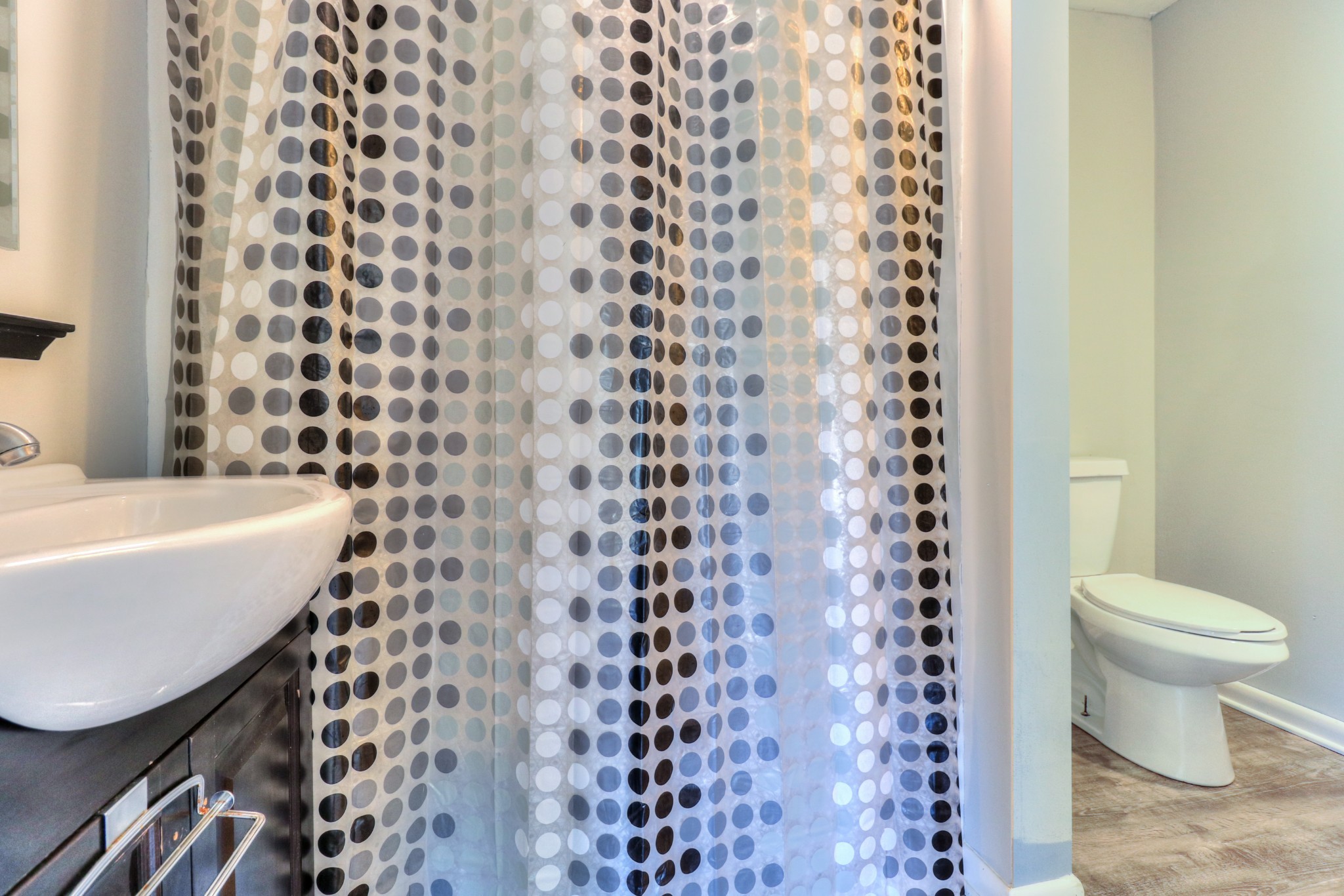 4437 Hickerson Road Manchester, TN 37355 - Photo 9 of 27 a bathroom with a sink toilet and shower