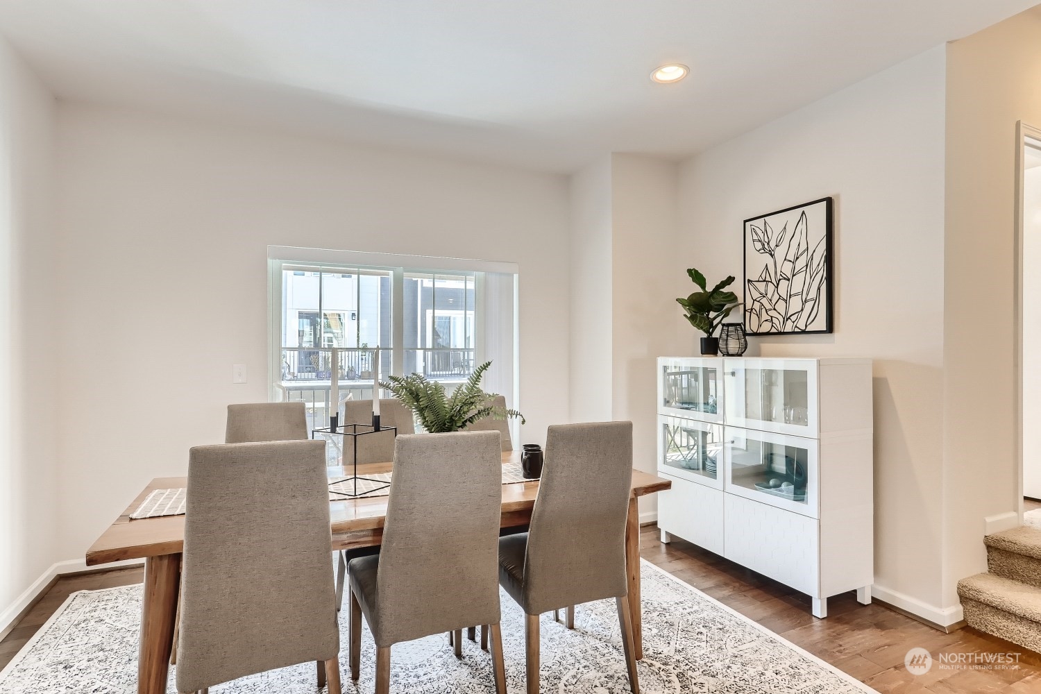 3270 Southwest Graham Street, Unit 502 Seattle, WA 98126 - Photo 15 of 32 a view of a dining room with furniture and a window