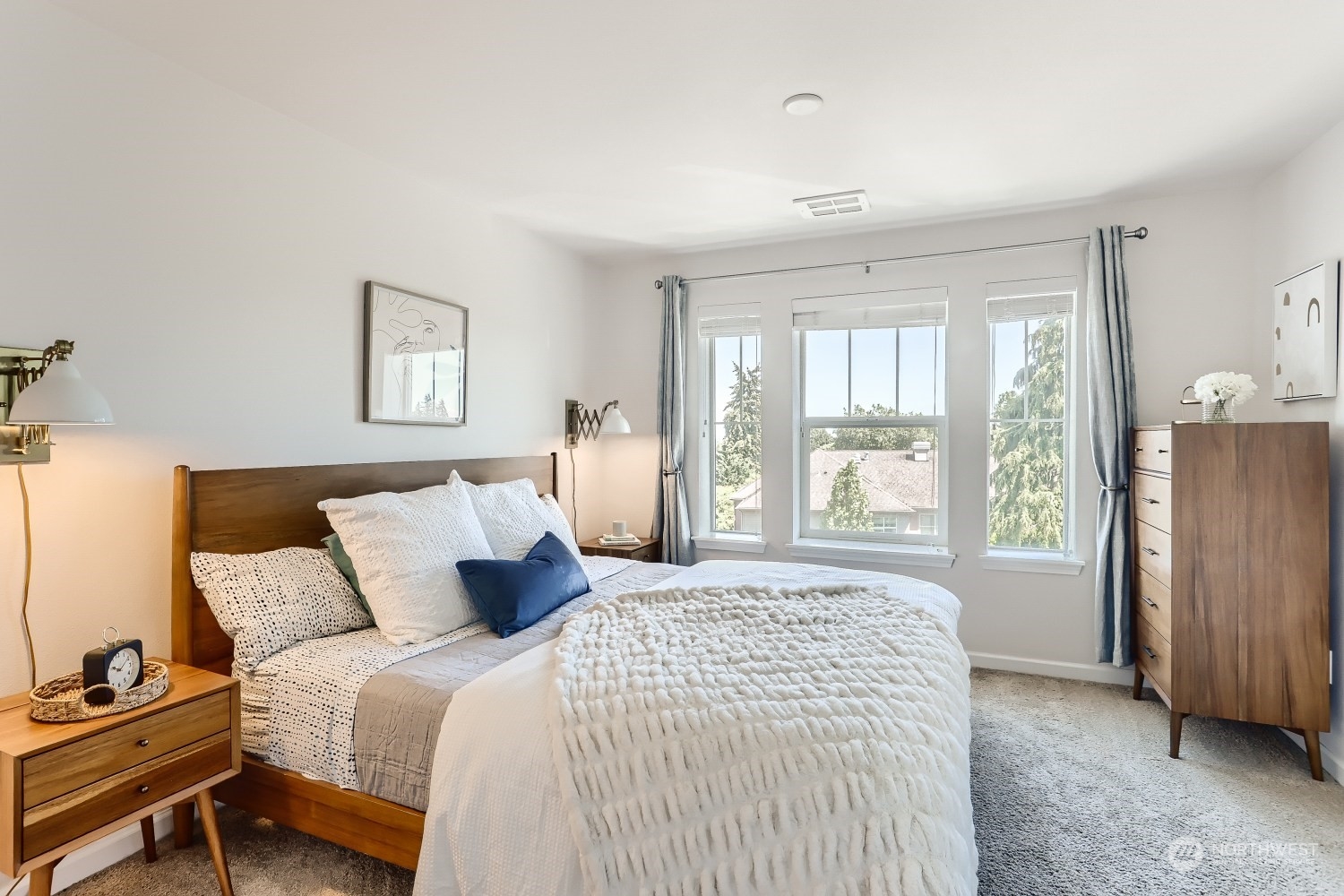 3270 Southwest Graham Street, Unit 502 Seattle, WA 98126 - Photo 18 of 32 a bedroom with a bed and a window