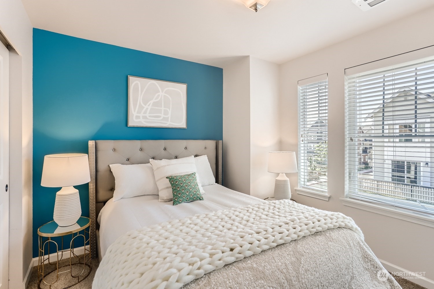 3270 Southwest Graham Street, Unit 502 Seattle, WA 98126 - Photo 21 of 32 a bedroom with a bed and window