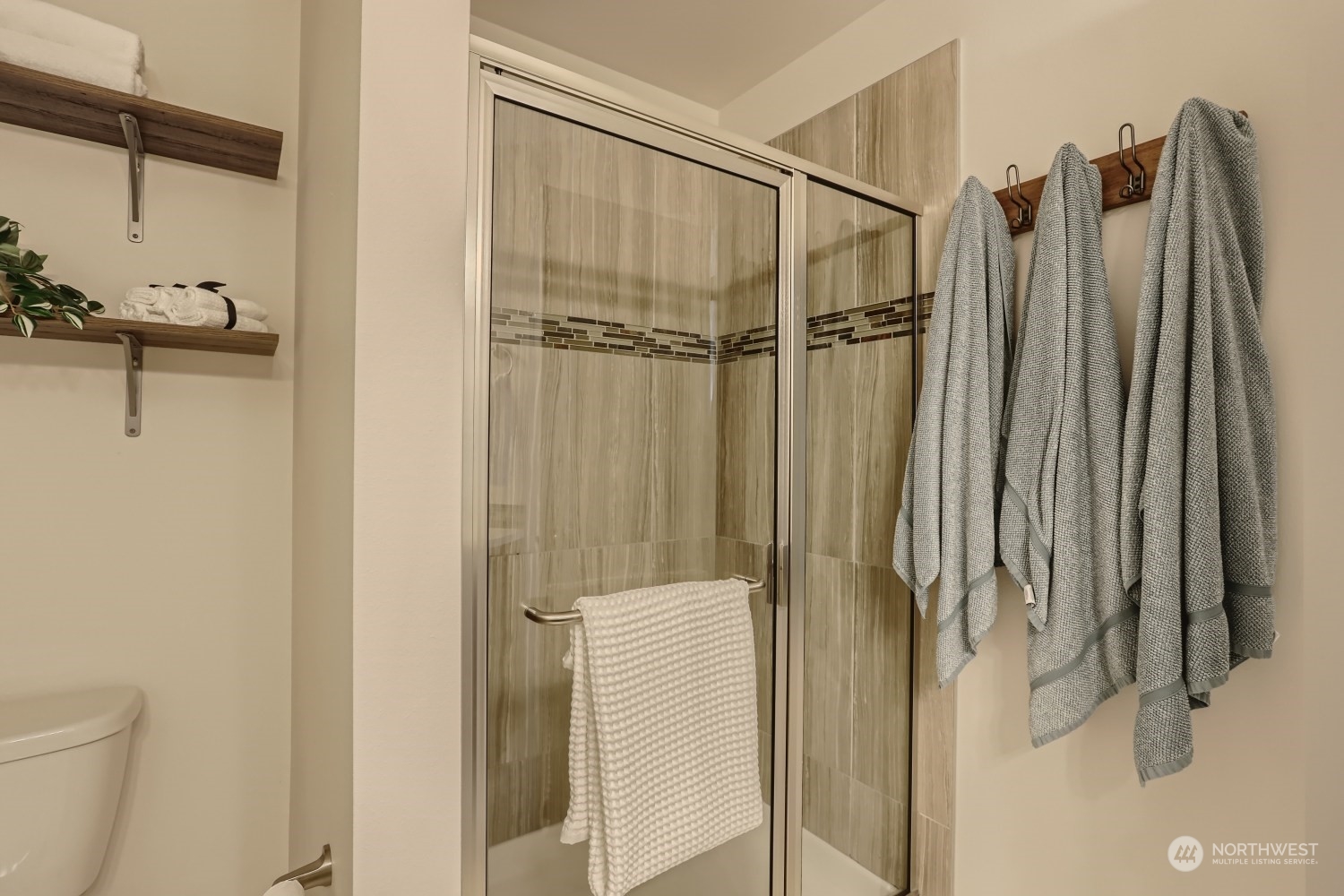 3270 Southwest Graham Street, Unit 502 Seattle, WA 98126 - Photo 24 of 32 a bathroom with a shower and a toilet