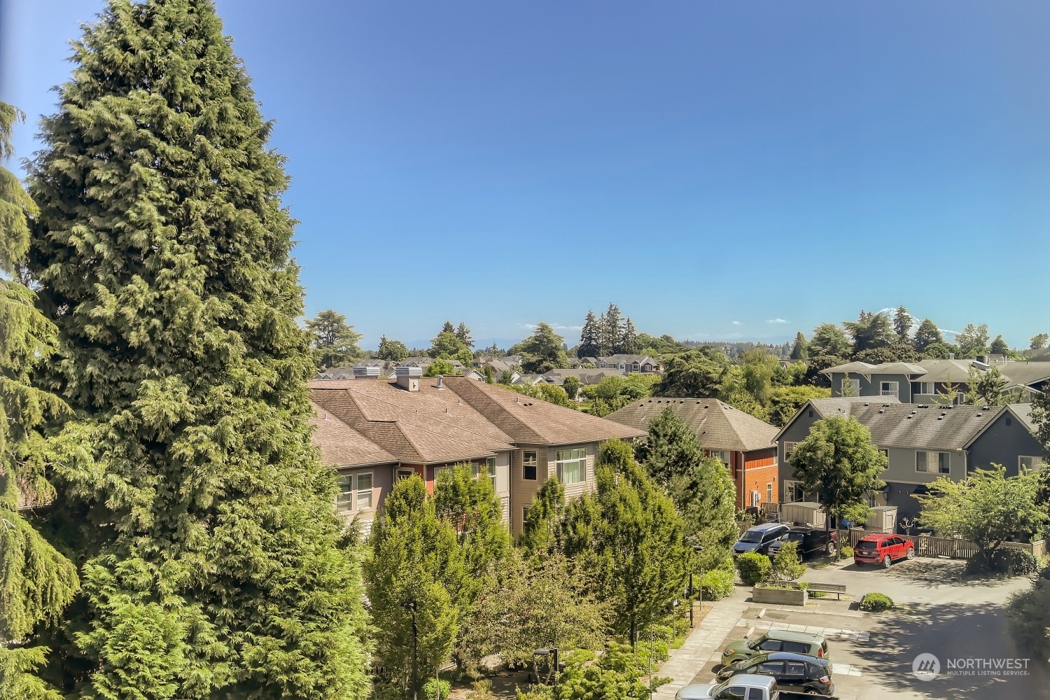 3270 Southwest Graham Street, Unit 502 Seattle, WA 98126 - Photo 27 of 32 a view of a town with residential houses