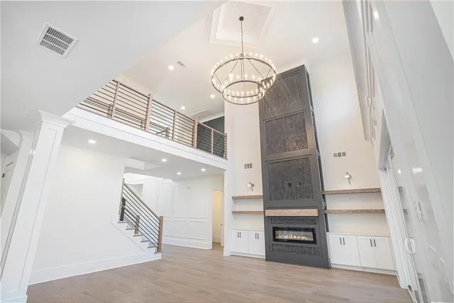 an entryway with wooden floor