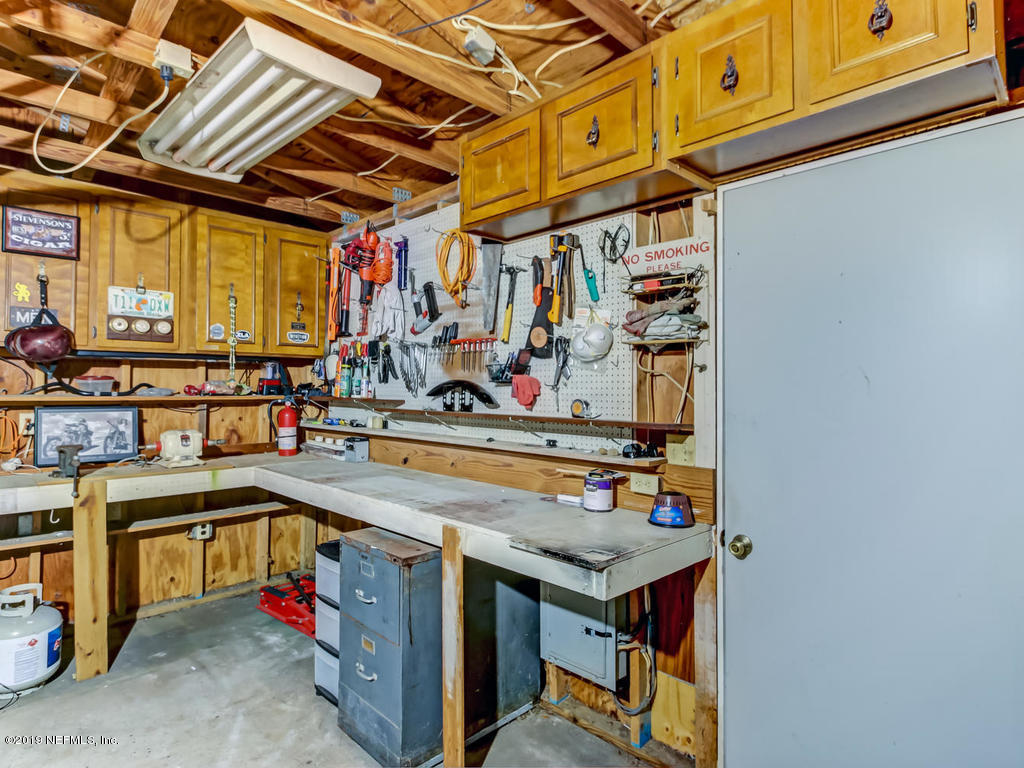 4629 Homestead Road Jacksonville, FL 32210 - Photo 25 of 27 a view of storage and utility room
