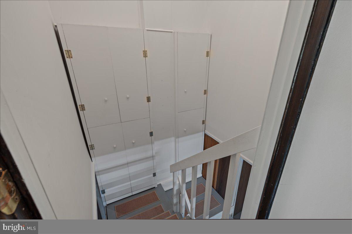 6912 Highbridge Road Bowie, MD 20720 - Photo 20 of 42 Built In Storage on way to basement