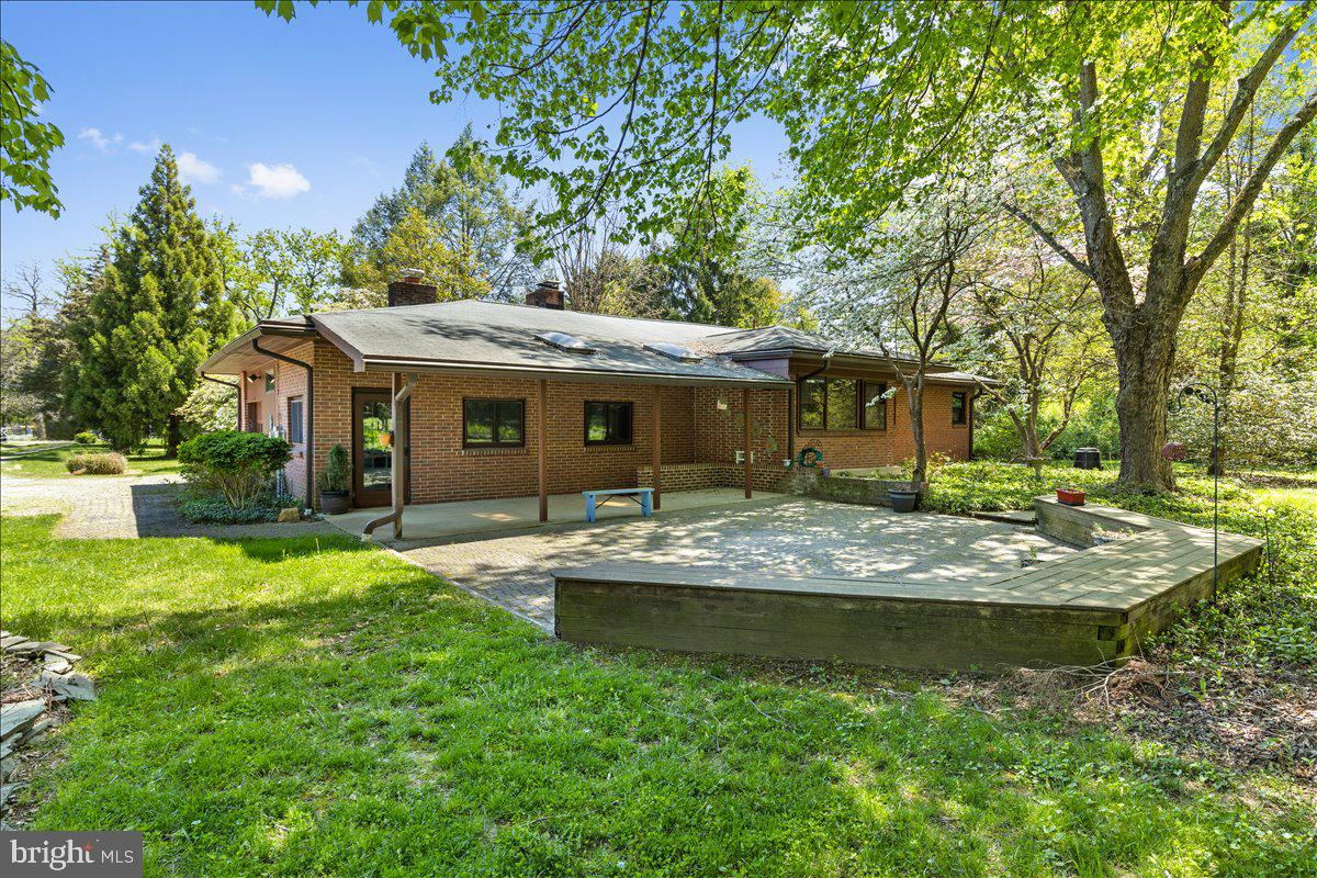 6912 Highbridge Road Bowie, MD 20720 - Photo 28 of 42 Back of house with patio