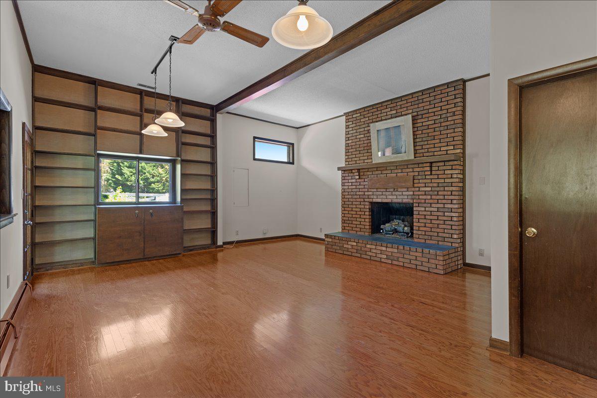 6912 Highbridge Road Bowie, MD 20720 - Photo 3 of 42 Family Room w/ Fireplace
