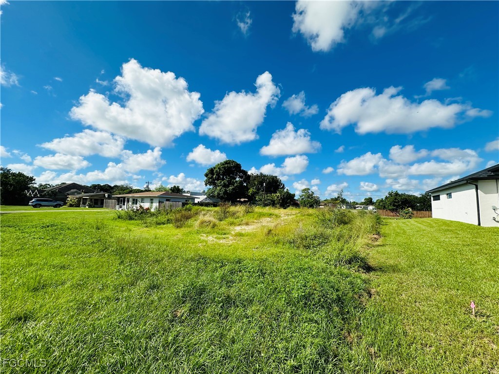 111 Connecticut Road Lehigh Acres, FL 33936 - Photo 8 of 8 a view of a houses with yard