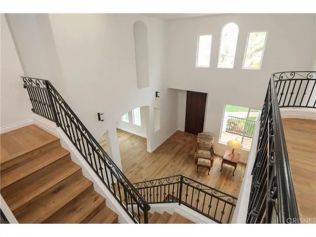 a view of a living room and workspace