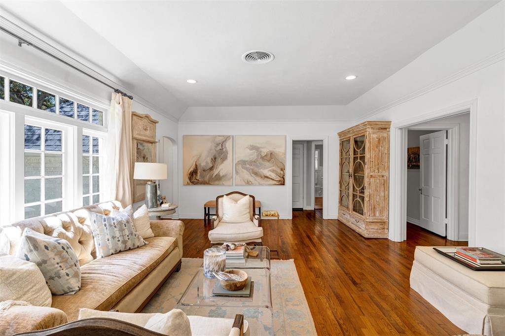 3170 Westcliff Road West Fort Worth, TX 76109 - Photo 9 of 39 a living room with furniture a wooden floor and next to a window