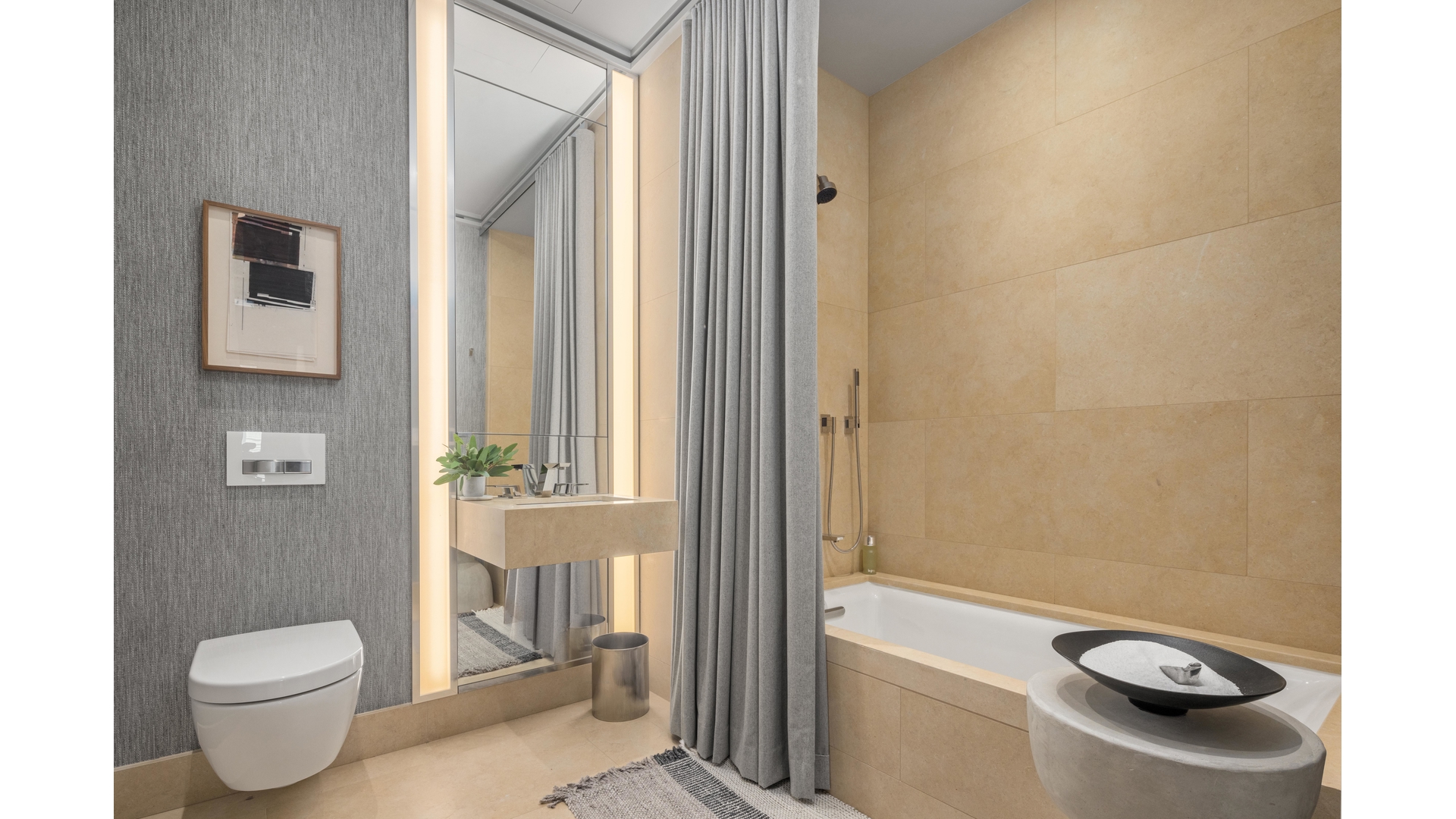53 West 53rd Street, Unit 66 Manhattan, NY 10019 - Photo 11 of 15 a bathroom with a toilet a sink and a bathtub