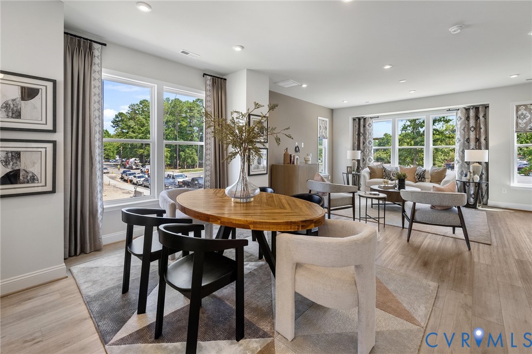 16112 Esteem Way Midlothian, VA 23113 - Photo 11 of 42 a view of a dining room with furniture window and outside view