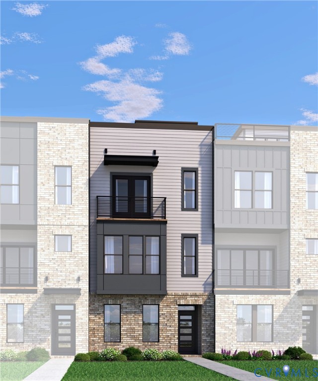 16112 Esteem Way Midlothian, VA 23113 - Photo 33 of 42 a front view of a building with glass windows and a yard