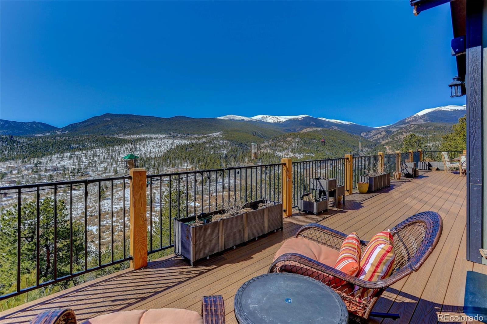 505 Rd P69 Bailey, CO 80421 - Photo 5 of 49 a balcony with table and chairs