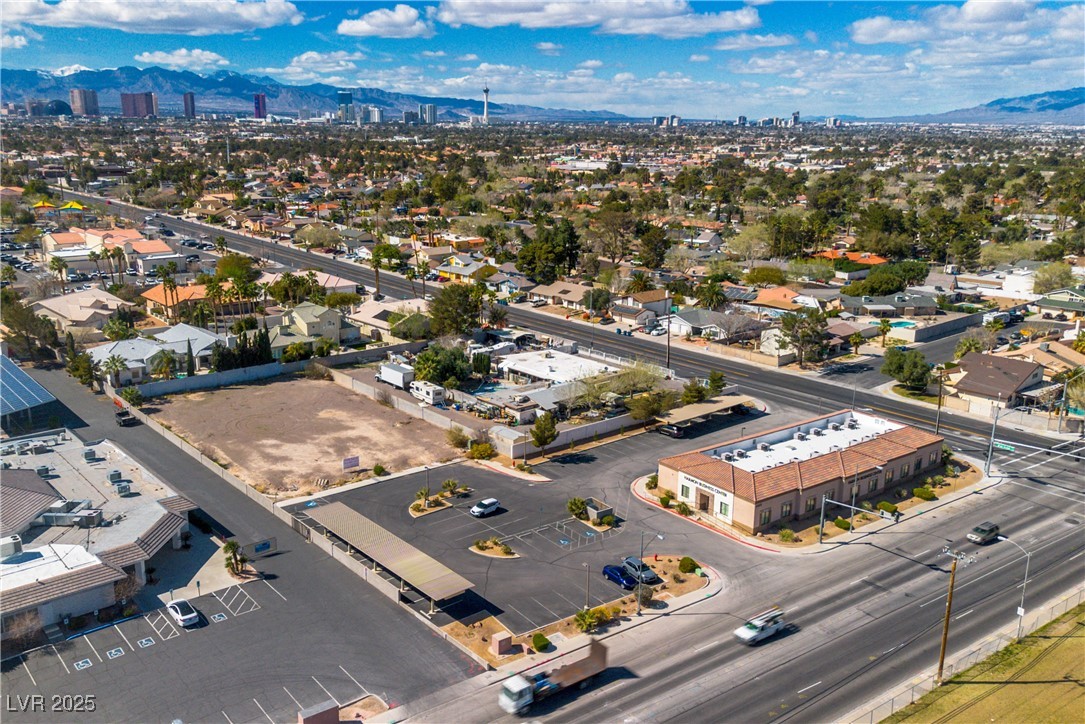 Harmon Las Vegas, NV 89121 - Photo 3 of 11 Drone / aerial view with a view of city and a moun